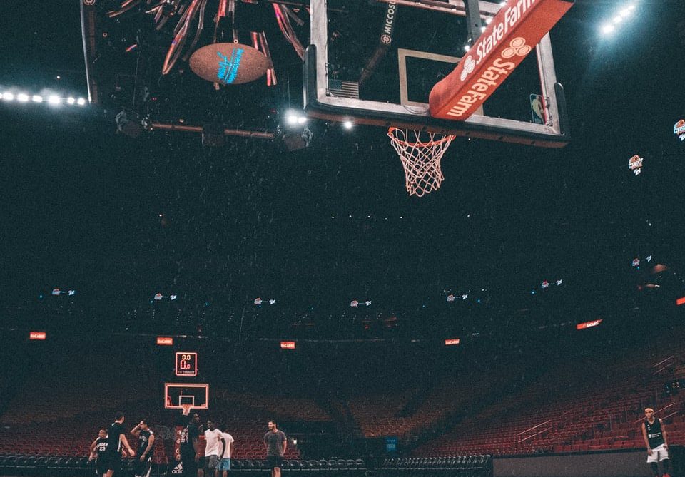 How high is an NBA basketball hoop? players inside basketball court