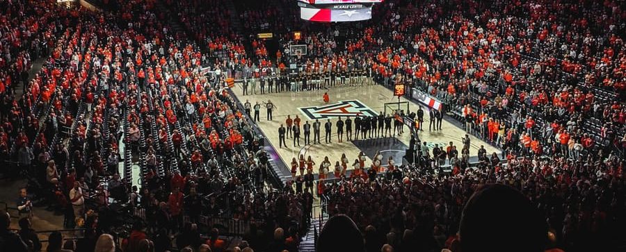 Halftime in college basketball is typically 20 minutes long. people watching a band on a concert