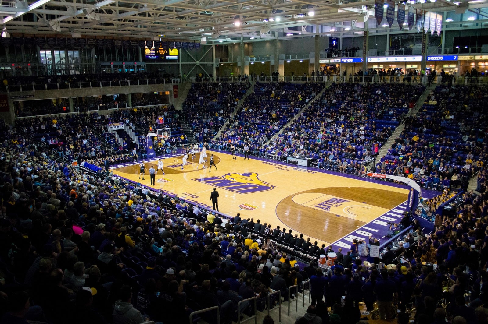 How long is halftime in college basketball?basketball court filled with people